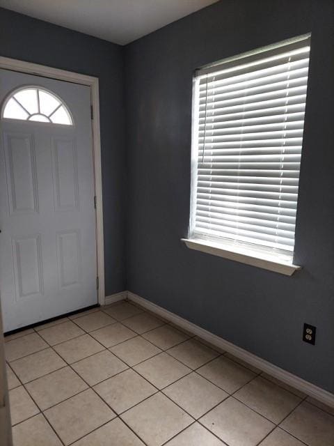 380 Rae Ann Blvd, Livingston, TX 77351 - foyer entrance with light tile patterned flooring