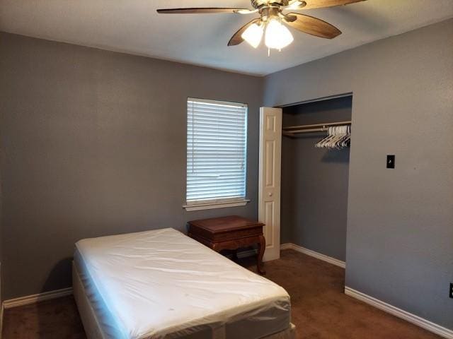 380 Rae Ann Blvd, Livingston, TX 77351 - bedroom with carpet flooring, a closet, and a ceiling fan