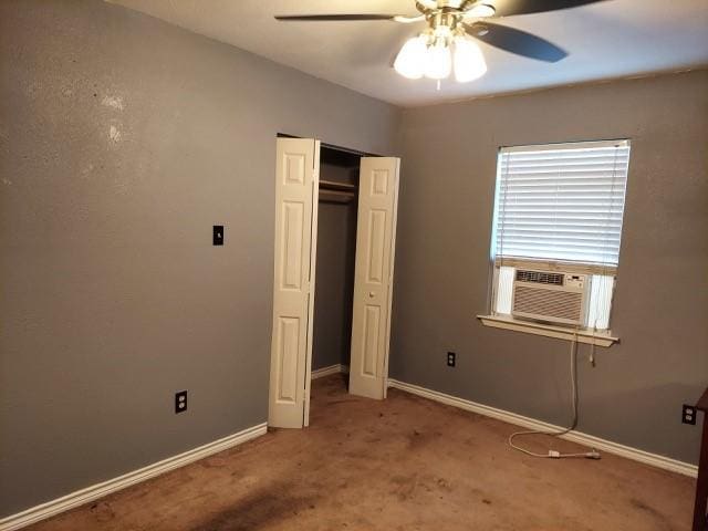 380 Rae Ann Blvd, Livingston, TX 77351 - unfurnished bedroom with cooling unit, carpet floors, a closet, and ceiling fan