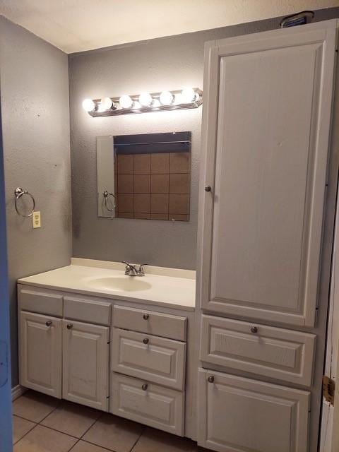 380 Rae Ann Blvd, Livingston, TX 77351 - bathroom with vanity and tile patterned floors