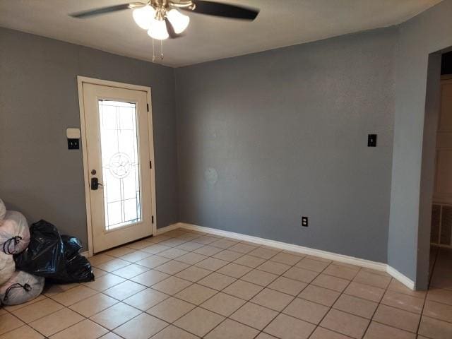 380 Rae Ann Blvd, Livingston, TX 77351 - entryway with ceiling fan, light tile patterned floors, and healthy amount of natural light