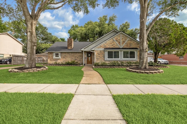 16217 Singapore Ln, Jersey Village, TX 77040 - ranch-style home with brick siding, a chimney, and a shingled roof