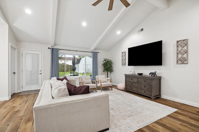 16217 Singapore Ln, Jersey Village, TX 77040 - living room with beamed ceiling, a ceiling fan, light wood-type flooring, recessed lighting, and high vaulted ceiling