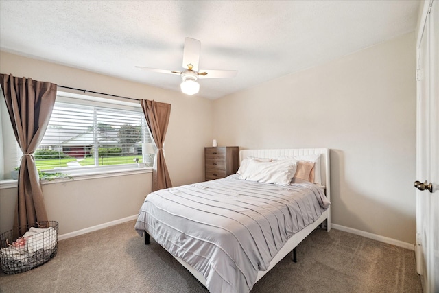 16217 Singapore Ln, Jersey Village, TX 77040 - carpeted bedroom featuring baseboards and ceiling fan