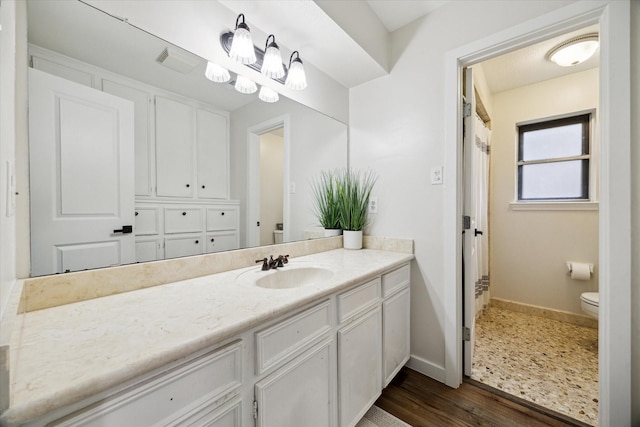 16217 Singapore Ln, Jersey Village, TX 77040 - full bath featuring vanity, wood finished floors, and a shower with curtain