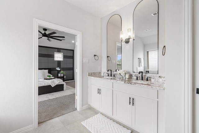 4118 Palmer Meadow Ct, Katy, TX 77494 - bathroom featuring double vanity, a ceiling fan, tile patterned flooring, and connected bathroom