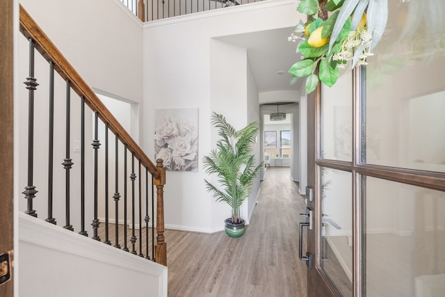 4118 Palmer Meadow Ct, Katy, TX 77494 - foyer with wood finished floors, a high ceiling, and stairs