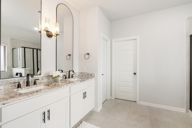 4118 Palmer Meadow Ct, Katy, TX 77494 - bathroom featuring a stall shower, double vanity, and tile patterned flooring