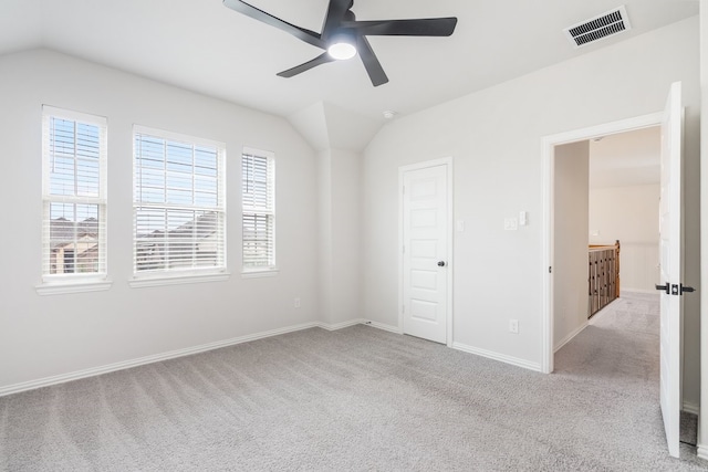 4118 Palmer Meadow Ct, Katy, TX 77494 - unfurnished bedroom with carpet floors, lofted ceiling, and a ceiling fan