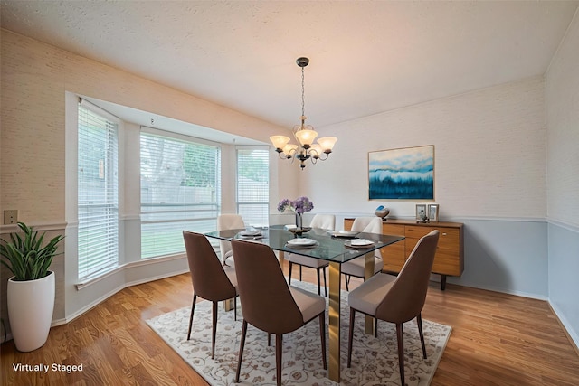 22522 Round Valley Dr, Katy, TX 77450 - dining room featuring a chandelier and light wood finished floors