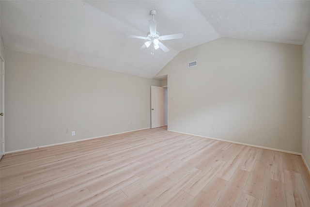 22522 Round Valley Dr, Katy, TX 77450 - spare room with a ceiling fan, light wood finished floors, and vaulted ceiling