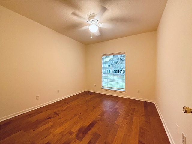 2147 Heather Green Dr, Houston, TX 77062 - unfurnished room featuring dark wood-style floors and ceiling fan