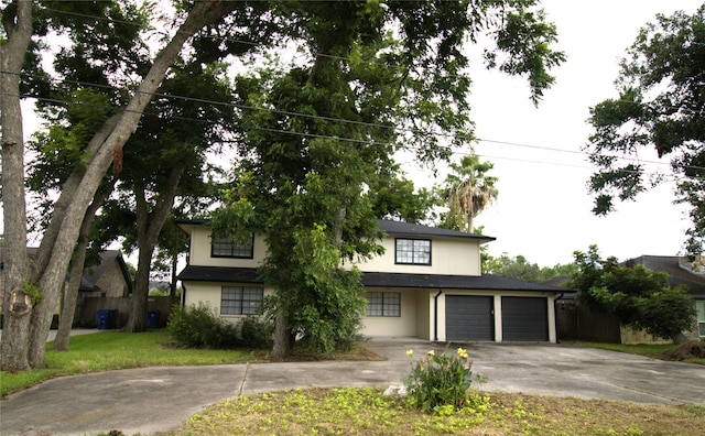 522 Oyster Creek Dr, Richwood, TX 77531 - view of front of home featuring driveway and stucco siding