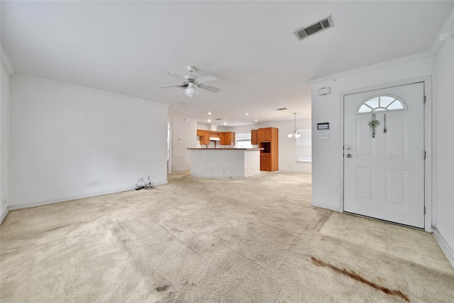 11307 Normeadow Ln, Houston, TX 77076 - entryway with ceiling fan, crown molding, light colored carpet, and recessed lighting