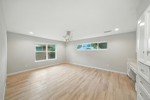 4003 Mischire Dr, Houston, TX 77025 - unfurnished room featuring light wood-type flooring and recessed lighting
