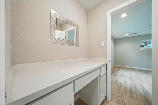 4003 Mischire Dr, Houston, TX 77025 - bathroom with vanity, wood finished floors, and recessed lighting