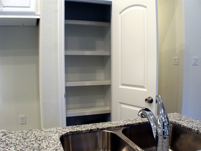 16725 Stonefield, Montgomery, TX 77316 - kitchen view of a sink and light stone counters