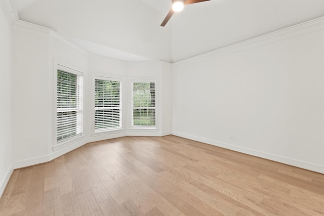 11 Forge Hill Pl, The Woodlands, TX 77381 - unfurnished room with a ceiling fan, light wood finished floors, vaulted ceiling, and crown molding