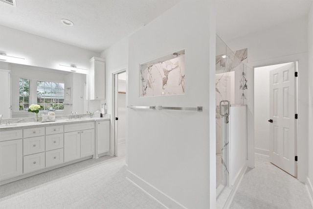 11 Forge Hill Pl, The Woodlands, TX 77381 - full bathroom featuring double vanity and a marble finish shower