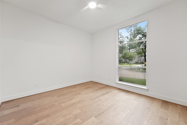 11 Forge Hill Pl, The Woodlands, TX 77381 - empty room with ceiling fan and light wood-style flooring
