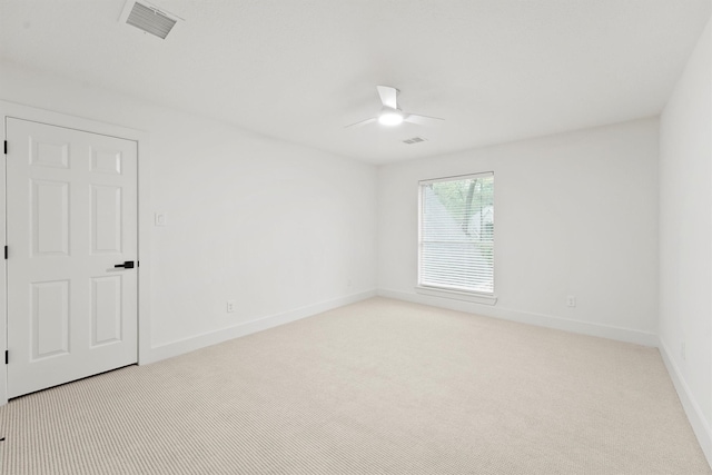 11 Forge Hill Pl, The Woodlands, TX 77381 - spare room with ceiling fan and light carpet