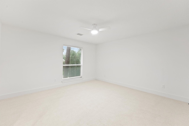 11 Forge Hill Pl, The Woodlands, TX 77381 - unfurnished room with light colored carpet and ceiling fan