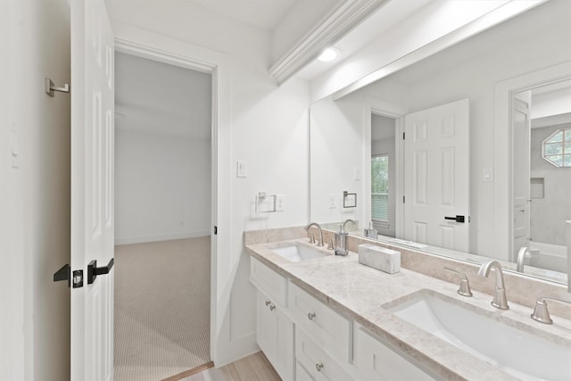 11 Forge Hill Pl, The Woodlands, TX 77381 - full bath featuring double vanity and baseboards