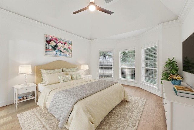 11 Forge Hill Pl, The Woodlands, TX 77381 - bedroom featuring vaulted ceiling, light wood-style floors, ceiling fan, and crown molding