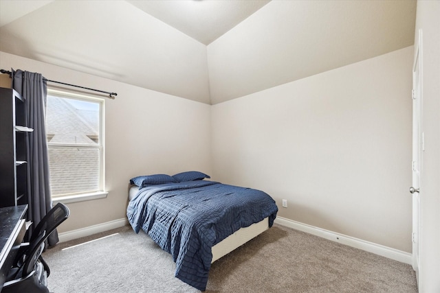 28842 Thornbird Ct, Katy, TX 77494 - carpeted bedroom featuring vaulted ceiling and baseboards