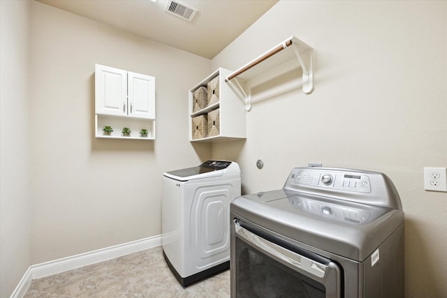 28842 Thornbird Ct, Katy, TX 77494 - laundry room featuring washer and dryer and baseboards