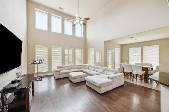 28842 Thornbird Ct, Katy, TX 77494 - living room with a ceiling fan, dark wood-style floors, and a towering ceiling