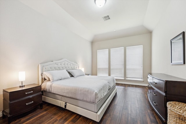 28842 Thornbird Ct, Katy, TX 77494 - bedroom with dark wood-type flooring and vaulted ceiling