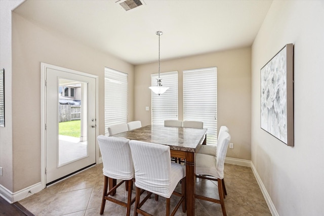 28842 Thornbird Ct, Katy, TX 77494 - dining space featuring baseboards and light tile patterned floors