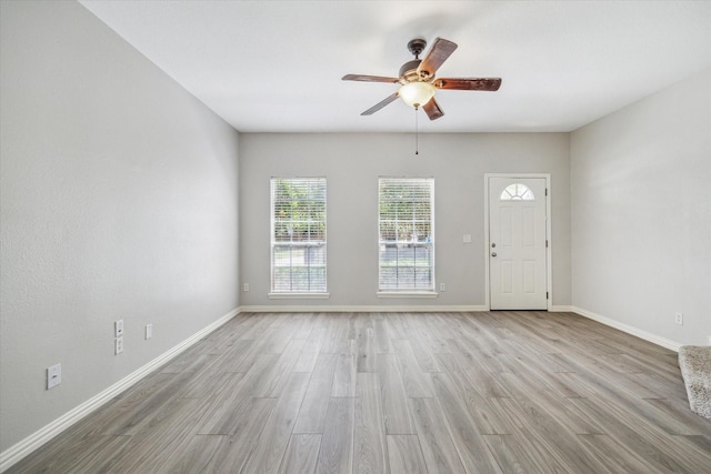2930 Grants Lake Blvd Unit 2104, Sugar Land, TX 77479 - entrance foyer featuring light wood-type flooring and ceiling fan