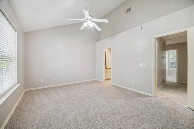 2930 Grants Lake Blvd Unit 2104, Sugar Land, TX 77479 - unfurnished bedroom with attic access, carpet floors, high vaulted ceiling, connected bathroom, and ceiling fan