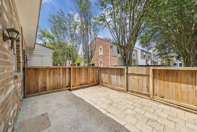 2930 Grants Lake Blvd Unit 2104, Sugar Land, TX 77479 - view of patio with a gate and a residential view