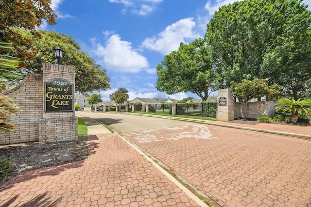 2930 Grants Lake Blvd Unit 2104, Sugar Land, TX 77479 - view of decorative road featuring sidewalks, street lights, and curbs