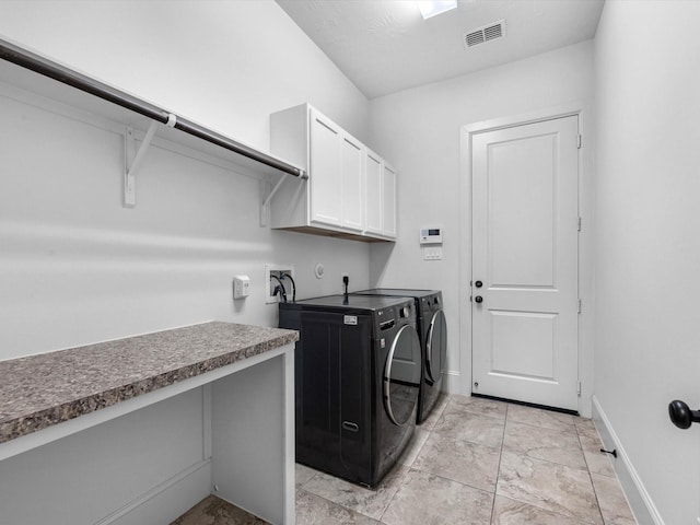 10515 Trinity Springs Dr, Cypress, TX 77433 - washroom featuring washer and dryer and cabinet space