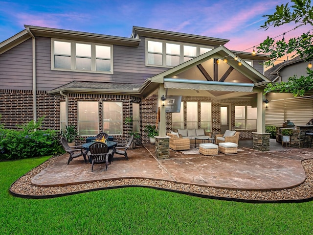 10515 Trinity Springs Dr, Cypress, TX 77433 - rear view of property with a patio, brick siding, and an outdoor hangout area