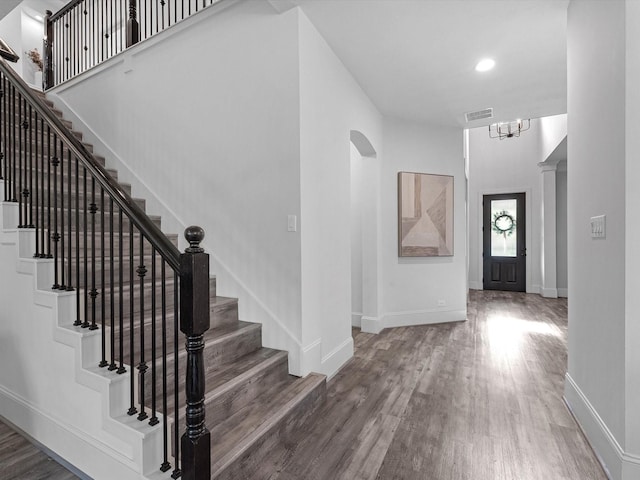 10515 Trinity Springs Dr, Cypress, TX 77433 - entrance foyer featuring wood finished floors, stairs, recessed lighting, and a chandelier