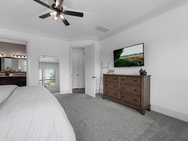 10515 Trinity Springs Dr, Cypress, TX 77433 - bedroom with carpet flooring, ornamental molding, a ceiling fan, and connected bathroom