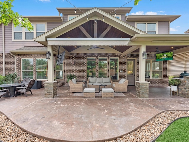 10515 Trinity Springs Dr, Cypress, TX 77433 - rear view of property featuring a ceiling fan, outdoor lounge area, brick siding, and a patio
