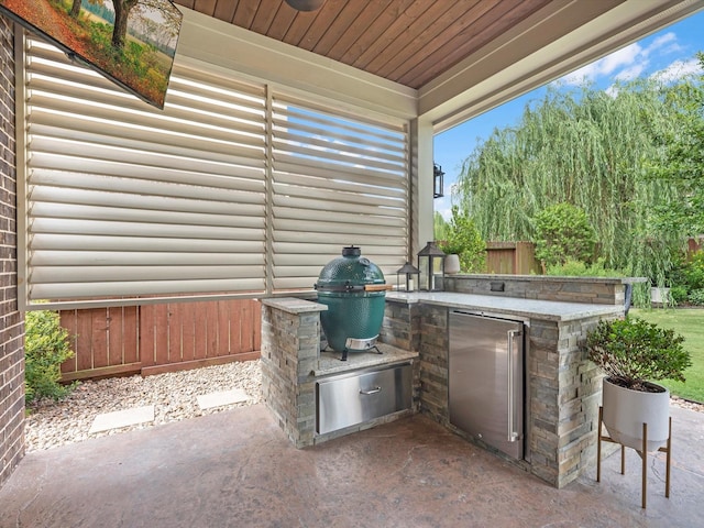 10515 Trinity Springs Dr, Cypress, TX 77433 - view of patio / terrace with an outdoor kitchen