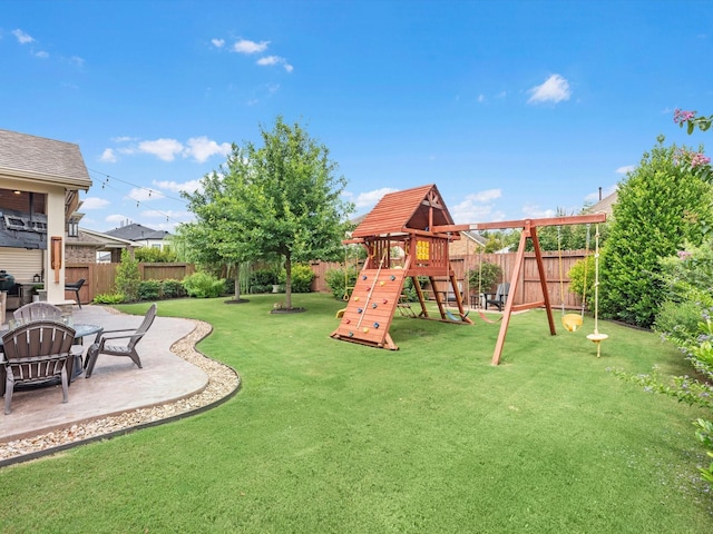 10515 Trinity Springs Dr, Cypress, TX 77433 - fenced backyard featuring a playground and a patio
