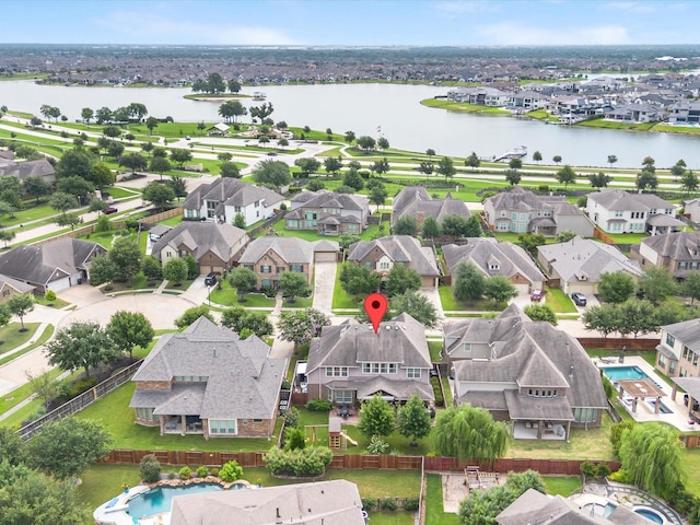 10515 Trinity Springs Dr, Cypress, TX 77433 - aerial view of residential area featuring a large body of water and a pool