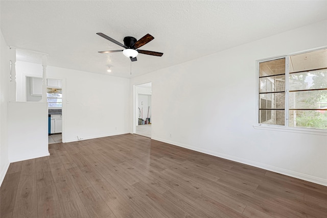 12434 Kathryn St, Houston, TX 77015 - spare room with wood finished floors and a ceiling fan