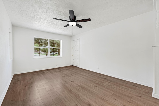 12434 Kathryn St, Houston, TX 77015 - unfurnished room featuring ceiling fan, wood finished floors, and a textured ceiling