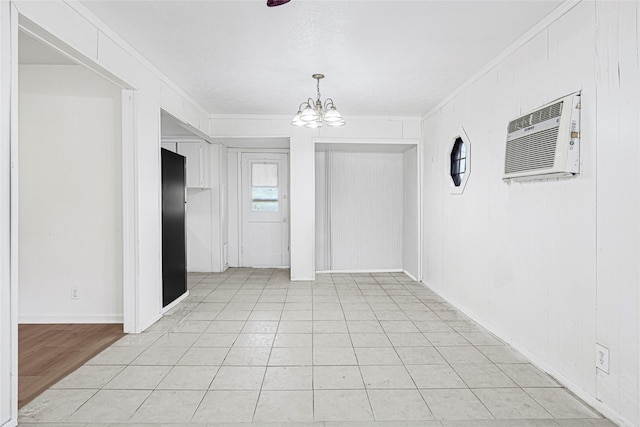 12434 Kathryn St, Houston, TX 77015 - empty room with ornamental molding, a chandelier, and an AC wall unit