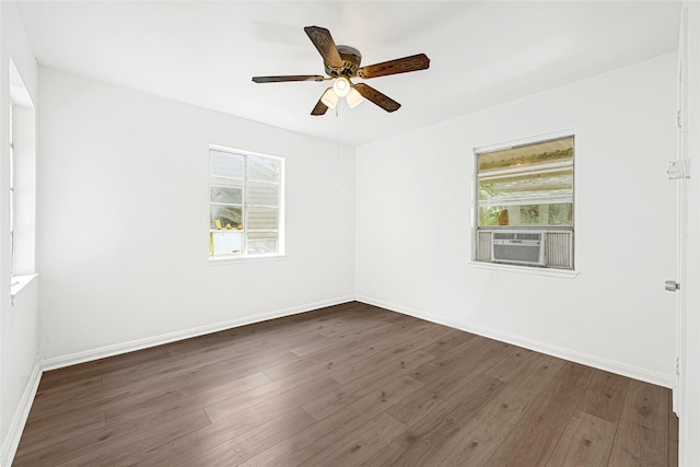 12434 Kathryn St, Houston, TX 77015 - empty room featuring healthy amount of natural light, ceiling fan, wood finished floors, and cooling unit