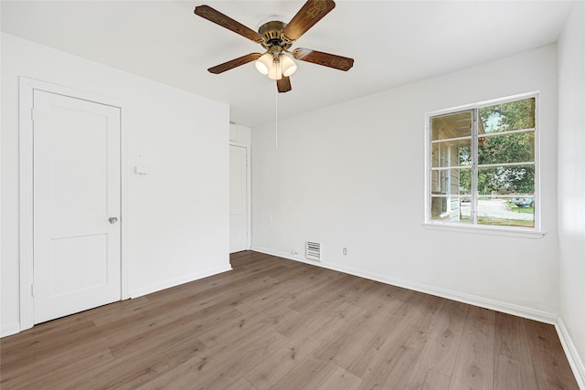 12434 Kathryn St, Houston, TX 77015 - unfurnished room featuring light wood-style floors and a ceiling fan
